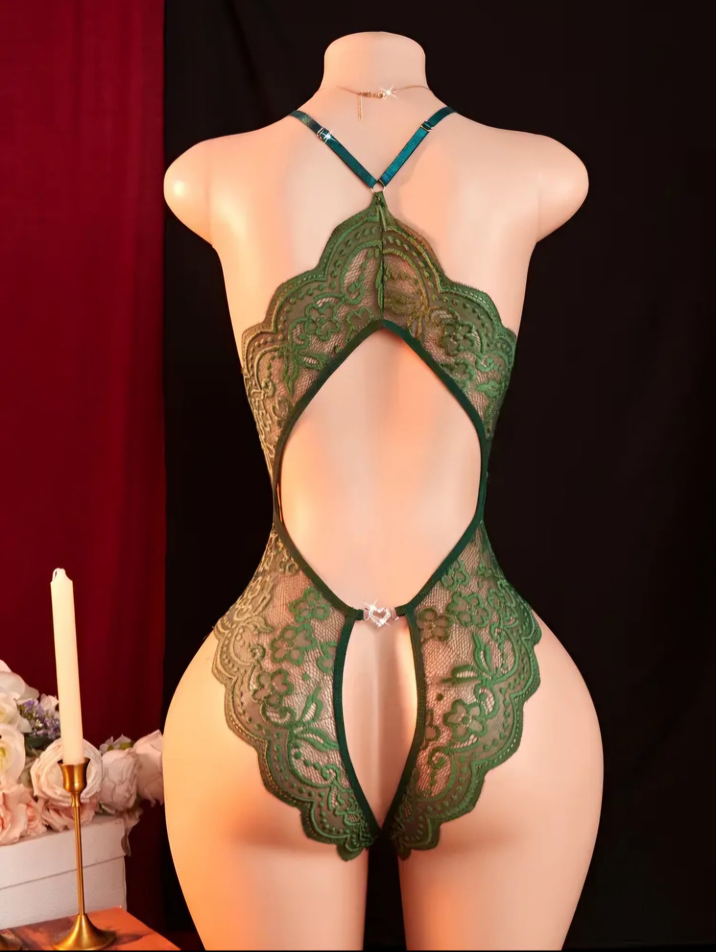 Emerald Enchantment Hollow-Out Teddy – Deep V Backless Lace Bodysuit with Open Crotch & Bow Accents. Size M